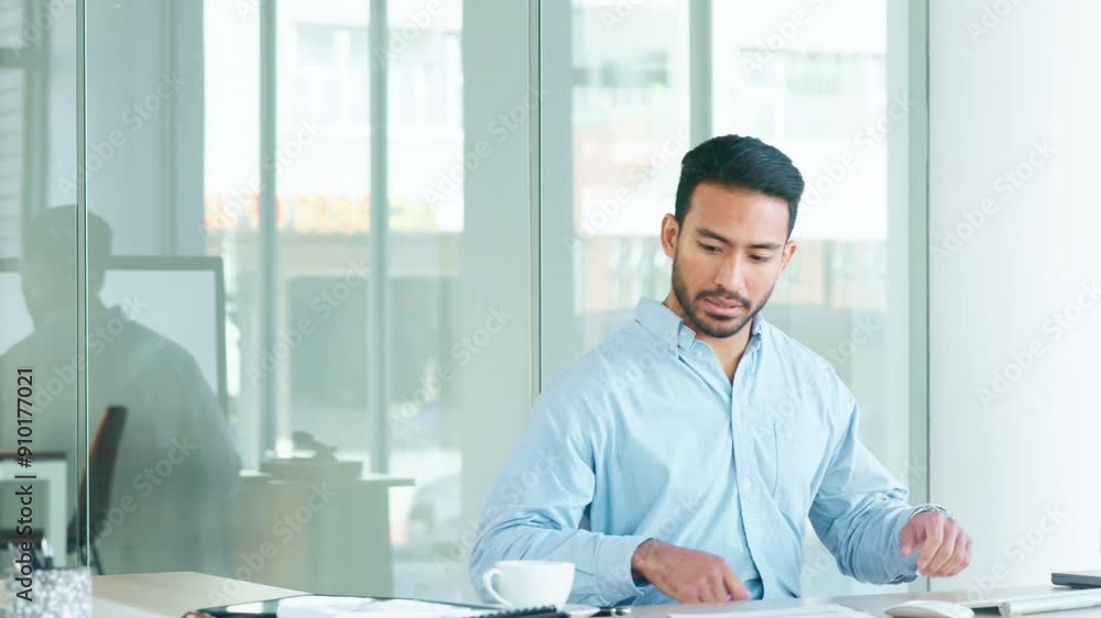 Financial advisor sitting at a desk while typing emails on a desktop computer in an office alone at work. One young and serious Asian finance manager arriving at work and browsing online Financial advisor sitting at a desk while typing emails on a desktop computer in an office alone at work. One young and serious Asian finance manager arriving at work and browsing online