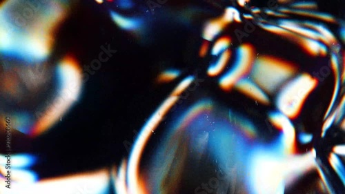 3d render abstract art video animation with surreal glass object in deformation transformation process with dispersion rainbow color spectrum prism effect on isolated black background