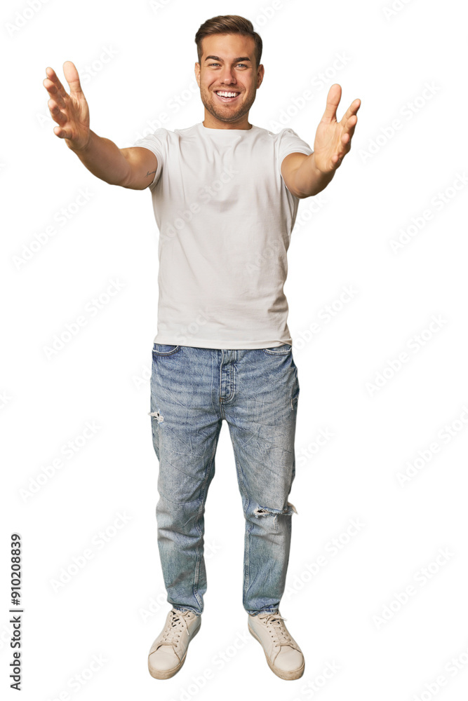Full body portrait of a man in studio feels confident giving a hug to the camera. Full body portrait of a man in studio feels confident giving a hug to the camera.