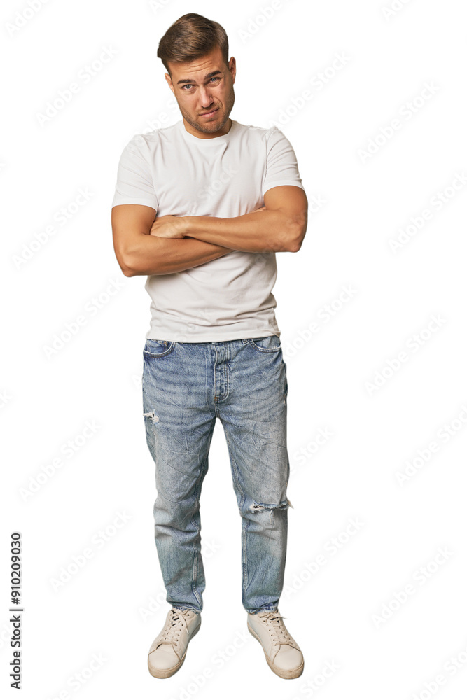 Full body portrait of a man in studio unhappy looking in camera with sarcastic expression. Full body portrait of a man in studio unhappy looking in camera with sarcastic expression.