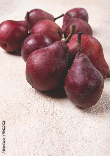 red pears scattered on the table, barletta pear, selective focus, no people, photo