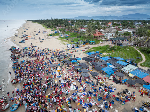 Aerial view of Tam Tien beach and fish market, Tam Ky, Quang Nam, Vietnam in the morning. Near Hoi An ancient town