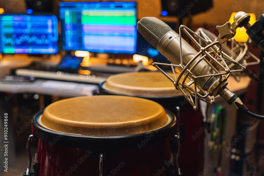Fototapeta premium conga drums in recording studio with microphones