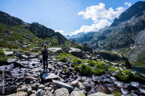 Young hiker woman in Vall de Boi, Aiguestortes and Sant Maurici National Park, Spain photo