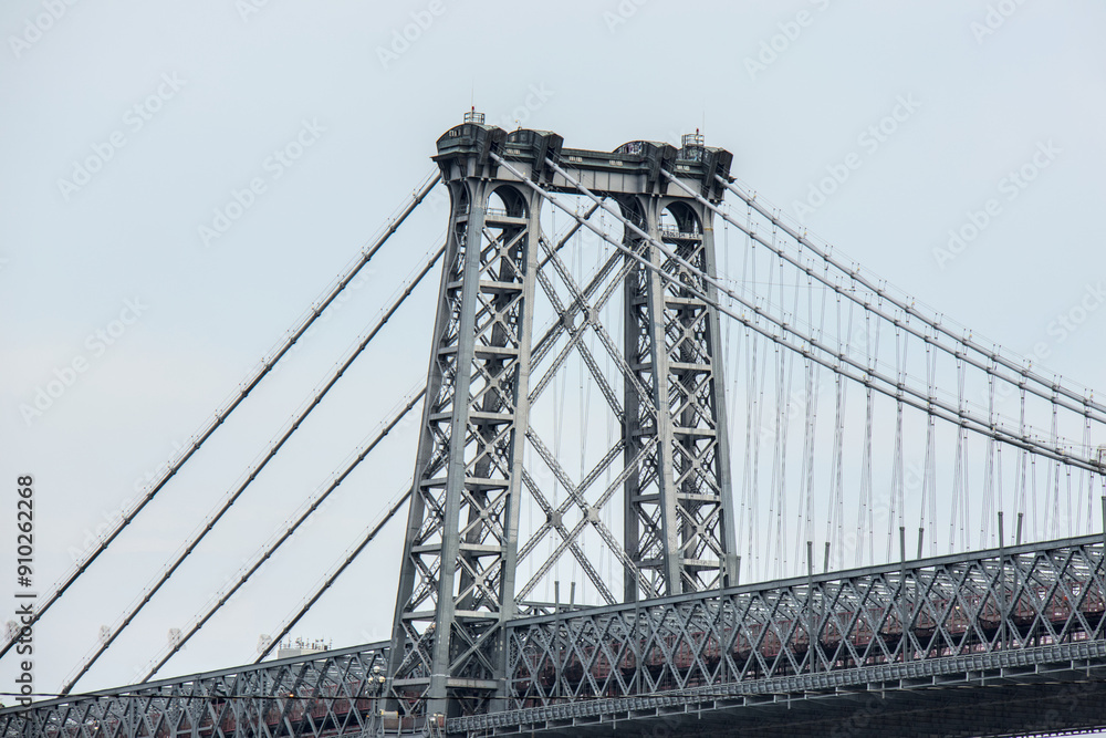 Naklejka premium williamsburg bridge detail from the manhattan side looking towards brooklyn (suspension bridge over hudson river) iconic nyc landmark tourist destination for art new york city