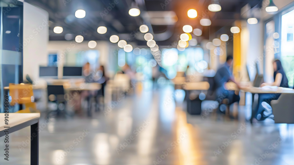 Blurred office space interior design. A blurred image of an office setting. The image is shot from a low angle, and the focus is on the desks and chairs in the background. Blurred office space interior design. A blurred image of an office setting. The image is shot from a low angle, and the focus is on the desks and chairs in the background.