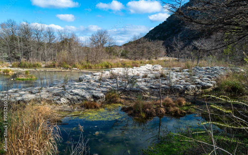 Frio River winding through scenic view of Hill Country terrain in Garner State Park