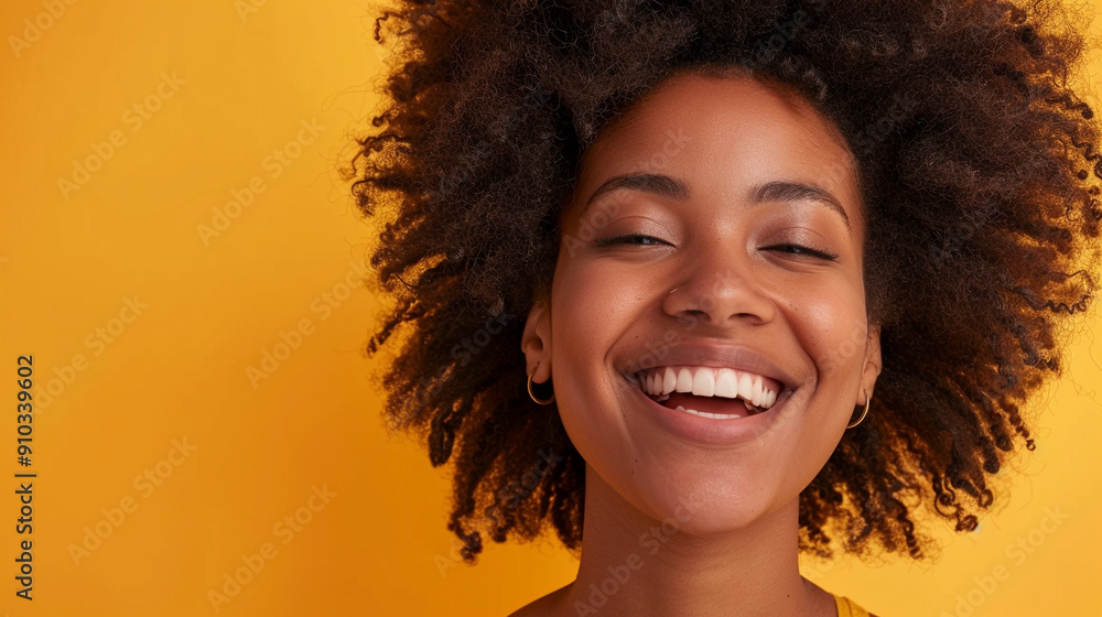 Happy woman isolated on pastel yellow background Happy woman isolated on pastel yellow background