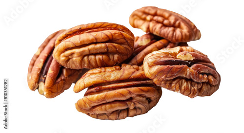 Pecan nuts, whole and pieces, scattered group isolated on white background. Top view