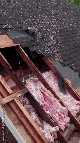 Damage to the roof of a home that occurred during hurricane Beryl.