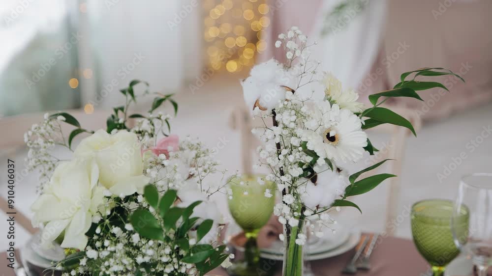 Close-up of fresh flowers that decorate the festive table at the event Close-up of fresh flowers that decorate the festive table at the event