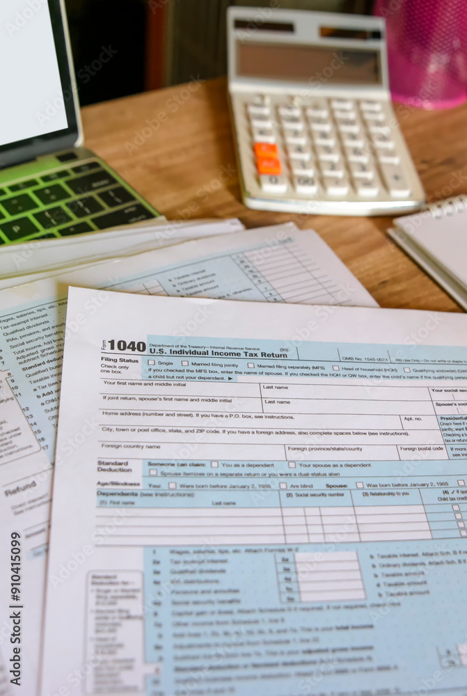 Planning Budget and Tax Concept. Individual Income 1040 Tax Form For who have income According to United States law. This is the season that has to pay and deadline of tax payment-vertical image. Planning Budget and Tax Concept. Individual Income 1040 Tax Form For who have income According to United States law. This is the season that has to pay and deadline of tax payment-vertical image.