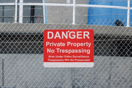 Warning Signs Surrounding The Gardiner Dam Turbines, Spillway And Reservoir On Lake Diefenbaker, Saskatchewan Canada photo