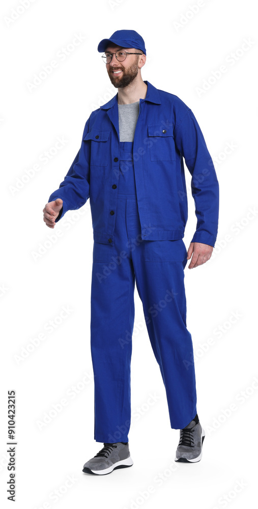 Professional auto mechanic walking on white background Professional auto mechanic walking on white background