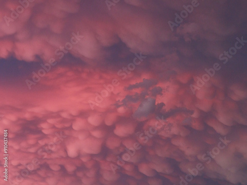 Mammatus clouds at Sunset in a dramatic pink and blue sky