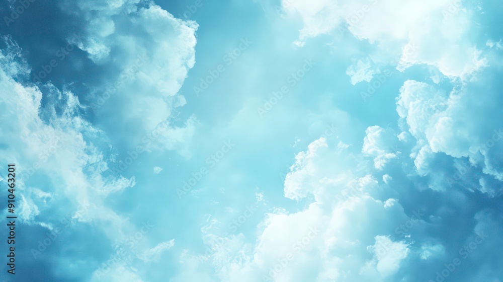 A serene blue sky with fluffy white clouds. A serene blue sky with fluffy white clouds.