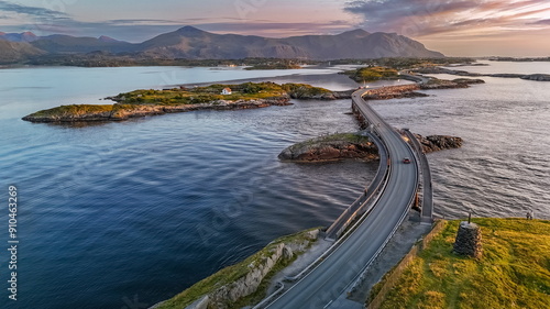 An evening view of the famous Norwegian Atlantic road crossing the ocean over the islands 