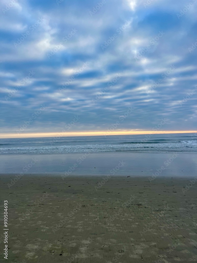 Obraz premium Malibu Beach with golden sands and crashing waves