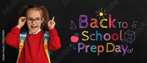 Little schoolgirl pointing ...
