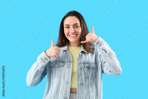 Cool young woman showing "c...