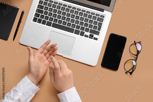 Woman applying hand sanitiz...