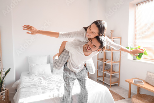 Happy young couple having f...