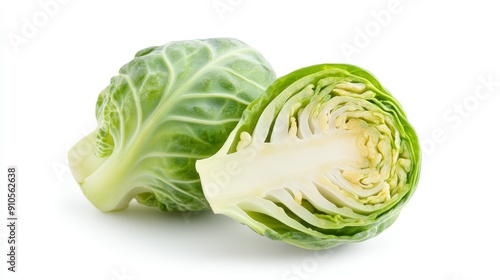 A single Brussels sprout halved, with delicate layers unfolding. Crisp detail and fresh look emphasized against a white background photo