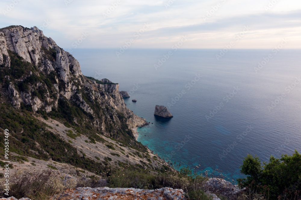 Amazing view at dusk down to the sea from the mountain in Othonoi island, north-west of Corfu, Greece Amazing view at dusk down to the sea from the mountain in Othonoi island, north-west of Corfu, Greece