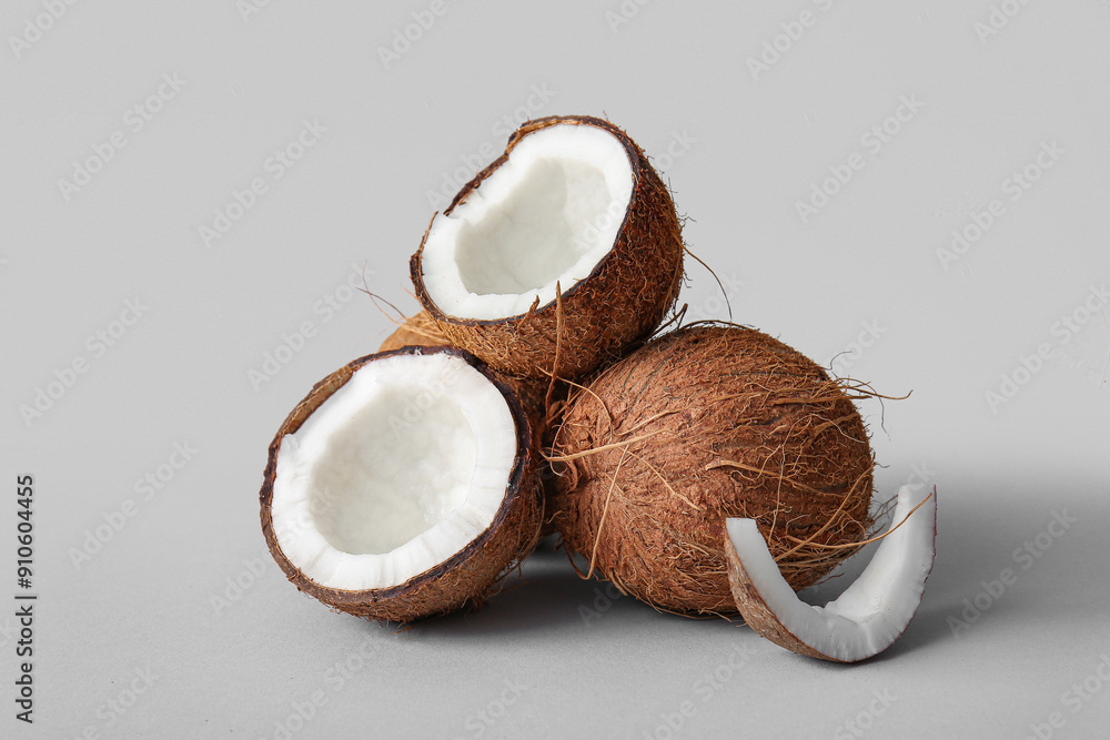 Fresh coconuts on grey background Fresh coconuts on grey background