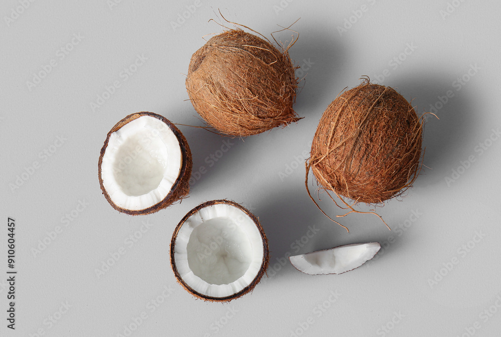 Fresh coconuts on grey background Fresh coconuts on grey background