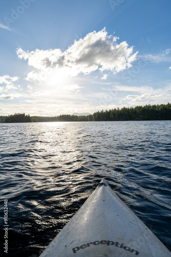 A beautiful view looking out from a kayak on Conway Lake in New Hampshire. photo