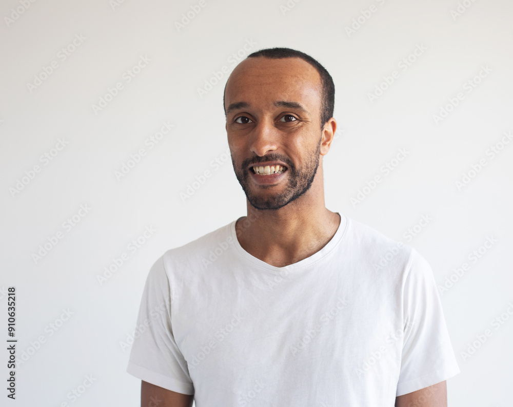 Photo of afro man wear white t-shirt isolated on grey background Photo of afro man wear white t-shirt isolated on grey background