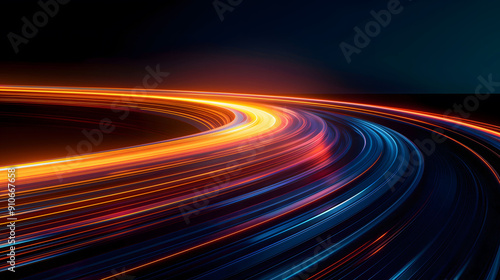 Abstract light trails with a sense of speed and motion, long exposure of car headlights on a winding road at night