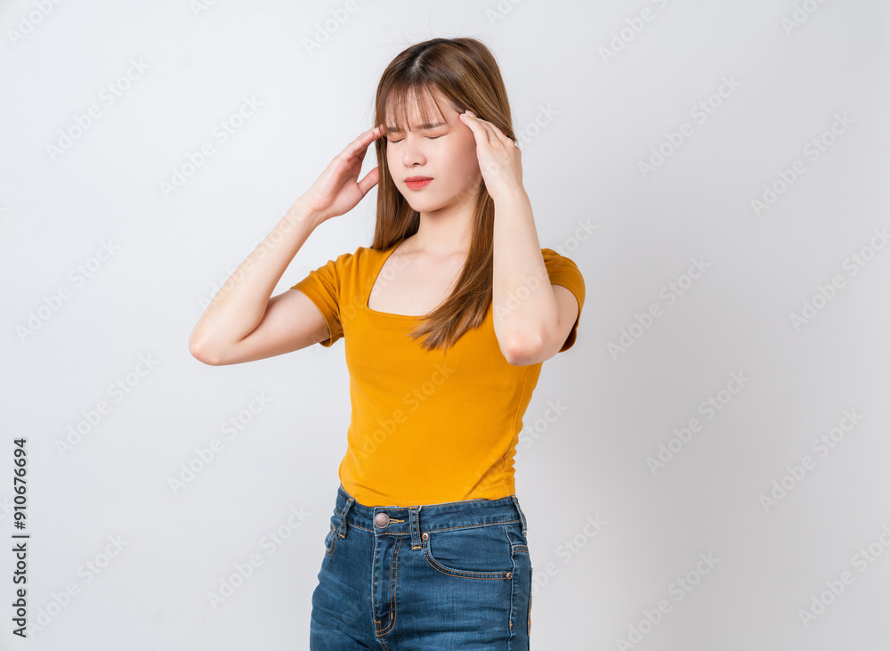 Unhealthy Asian woman touching body and have a headache on white background. Unhealthy Asian woman touching body and have a headache on white background.
