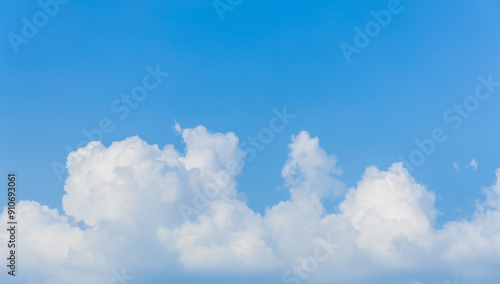 Blue sky on a sunny day. white cumulus clouds