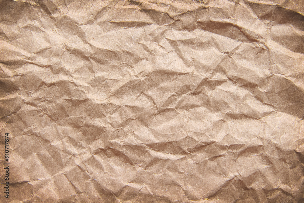 Fototapeta premium Light brown paper texture background with wrinkle patterns