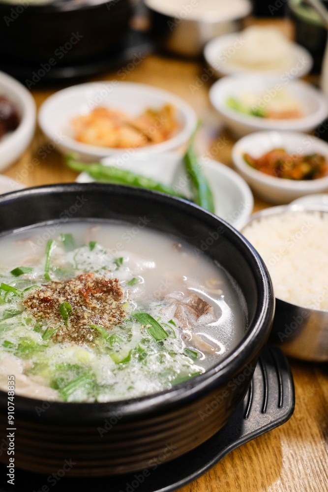 clay pot of soondae gukbap (blood sausage soup) with steamed rice and assorted banchan, such as kimchi and green chilli peppers, at Yeodongsik - a Korean restaurant in Sydney, Australia clay pot of soondae gukbap (blood sausage soup) with steamed rice and assorted banchan, such as kimchi and green chilli peppers, at Yeodongsik - a Korean restaurant in Sydney, Australia