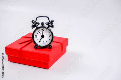 A clock on the gift box.
