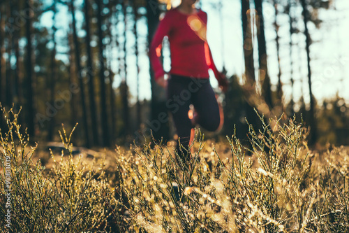 Photography Basic Workout - Woman running off-trail in Nordic forest