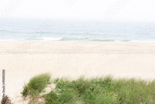 Wallpaper Mural Empty beach with waves crashing Torontodigital.ca