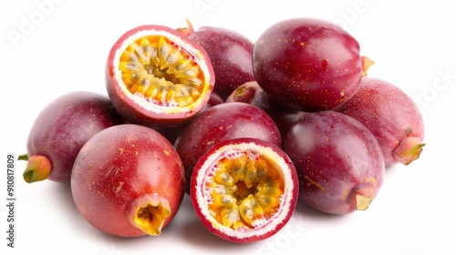 A pile of passionfruit, some whole, some halved, displaying the lush interior and rich skin texture, all on a plain white background