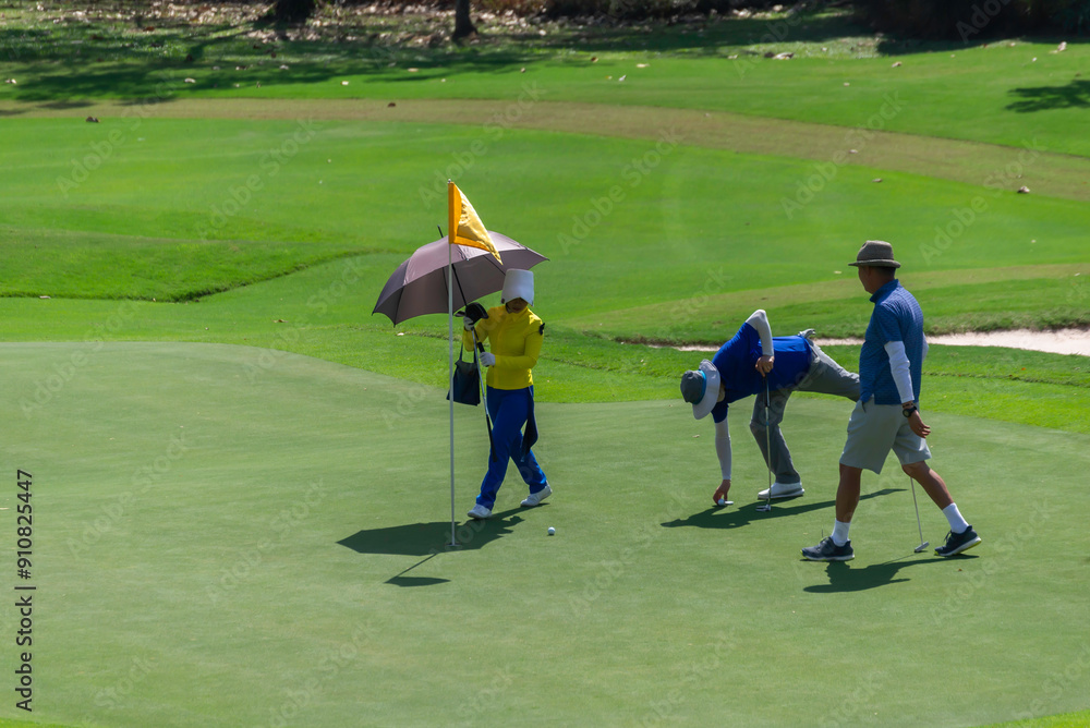 Obraz premium Caddy on fairway at country club golf course. lifestyle sport training golfing at golf club on summer holiday vacation.