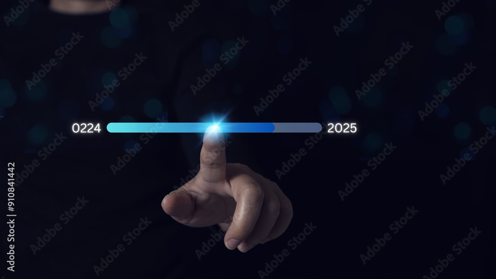 Start new business and new life, Planning,opportunity, challenge and business strategy in new year 2025. Businessman touching status bar to change from 2024 to 2025. Start new business and new life, Planning,opportunity, challenge and business strategy in new year 2025. Businessman touching status bar to change from 2024 to 2025.