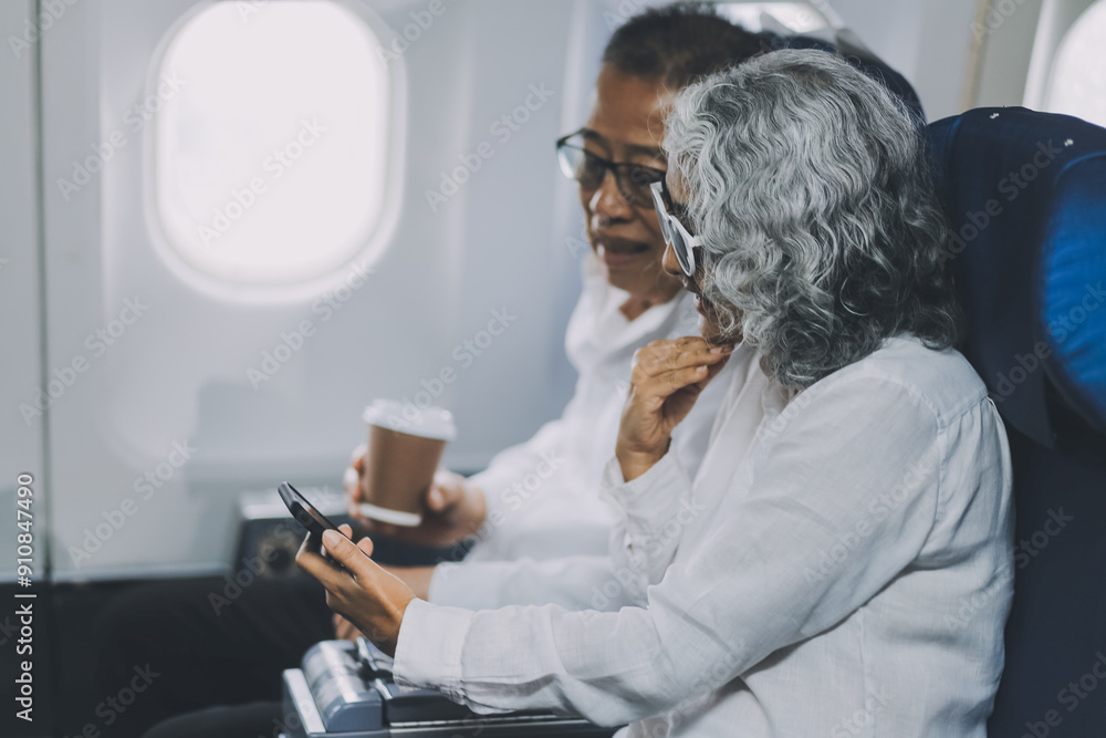 Happy elderly senior couple of travelers with suitcase in airport Happy elderly senior couple of travelers with suitcase in airport