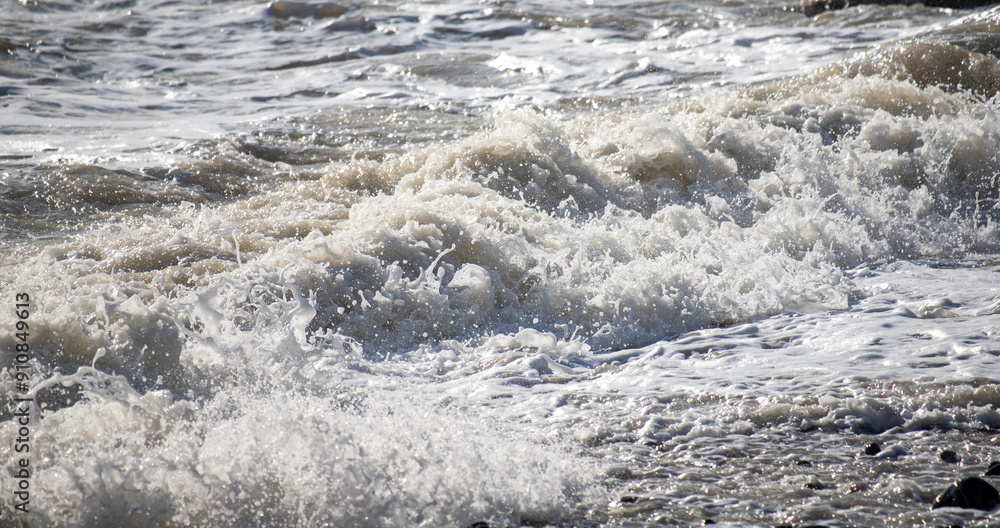 Seashore, small stones, sea wave. Marine background. Seashore, small stones, sea wave. Marine background.