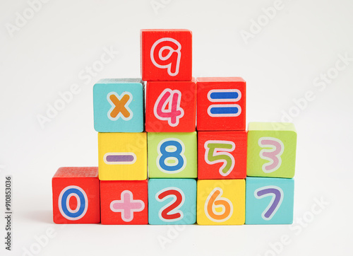 Number wood block cubes for learning Mathematic, education math concept.