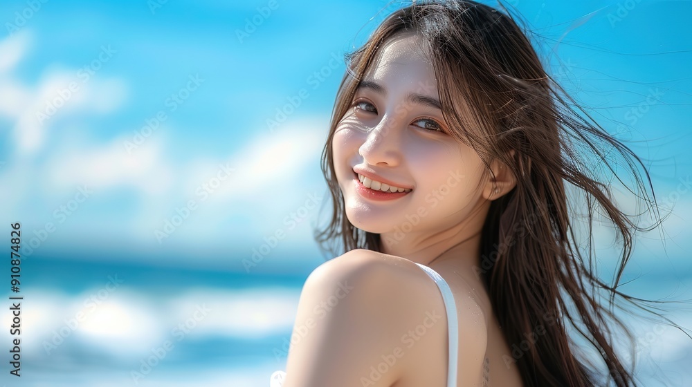 Beautiful woman in a white dress posing on the beach with a happy smile, looking at the camera under a clear blue sky and sea background, with wind blowing her hair, captured in natural light Beautiful woman in a white dress posing on the beach with a happy smile, looking at the camera under a clear blue sky and sea background, with wind blowing her hair, captured in natural light