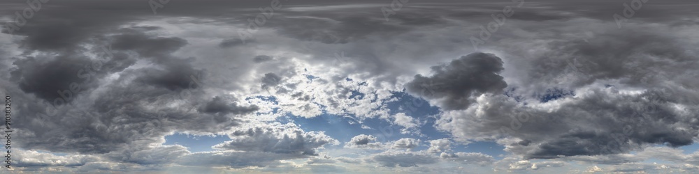 Obraz premium blue sky hdri 360 panorama with dark clouds before storm in seamless equirectangular projection with zenith for use in 3d graphics as skydome or edit drone panoramas for sky replacement