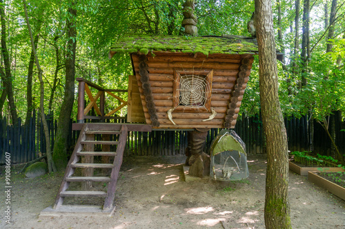 A hunter's house with a spider's web on the window