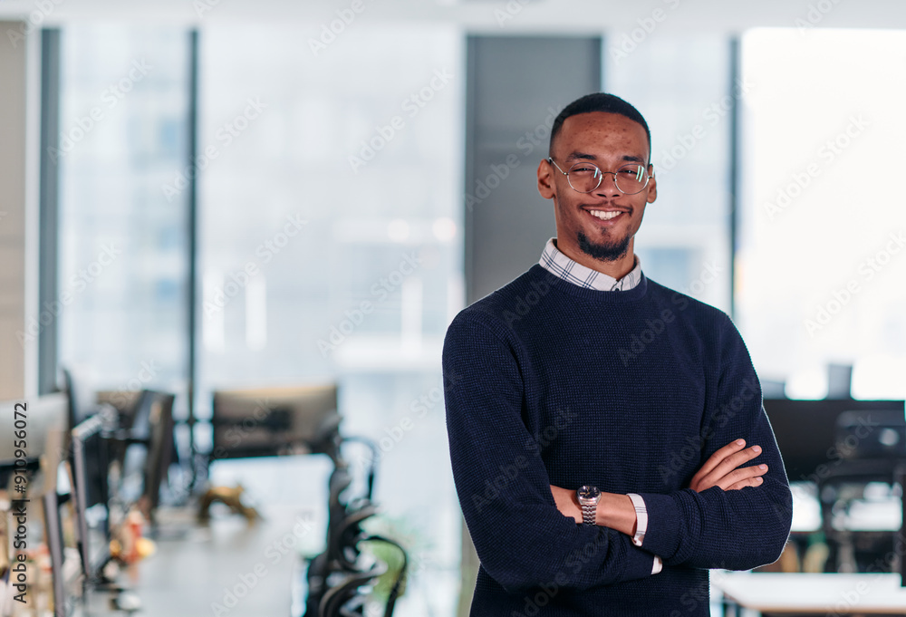 Confident African American Businessman Posing in Modern Startup Office. Confident African American Businessman Posing in Modern Startup Office.